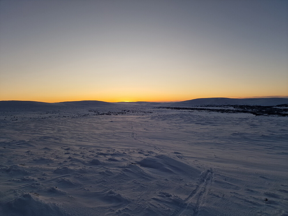 Solnedgang fra toppen av Skarven