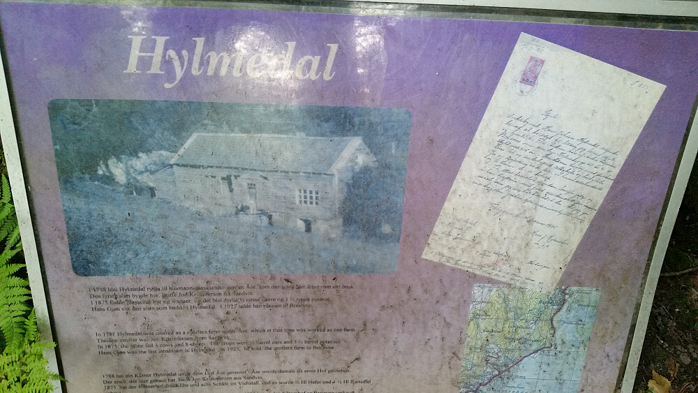 plakat ved hus grunnen 