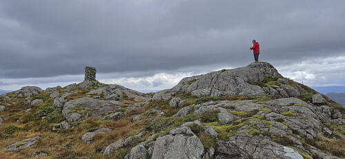 Petter at the summit with the cairn to the left