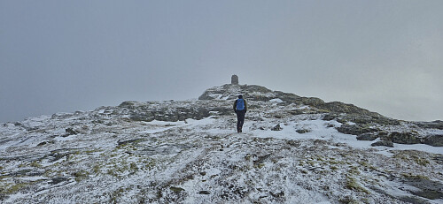 Endre approaching the summit cairn