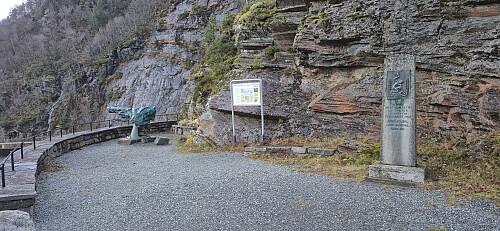 A small war memorial from WW2 next to the top of the waterfall