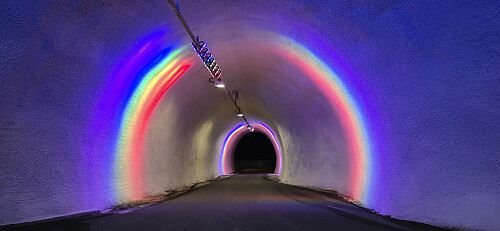 The rainbow colored lights in the walking/cycling tunnel used get on/off the bridge