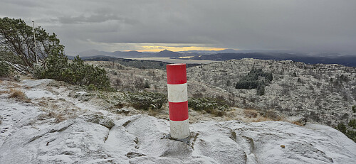 The trig marker at Tellevikafjellet with Lyderhorn in the background