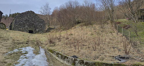 Looking back at the unmarked trailhead (three stone steps, right of center) in Selvik