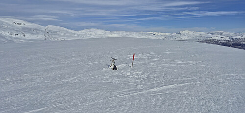 The visitor register at Helleberget with the real summit in the background