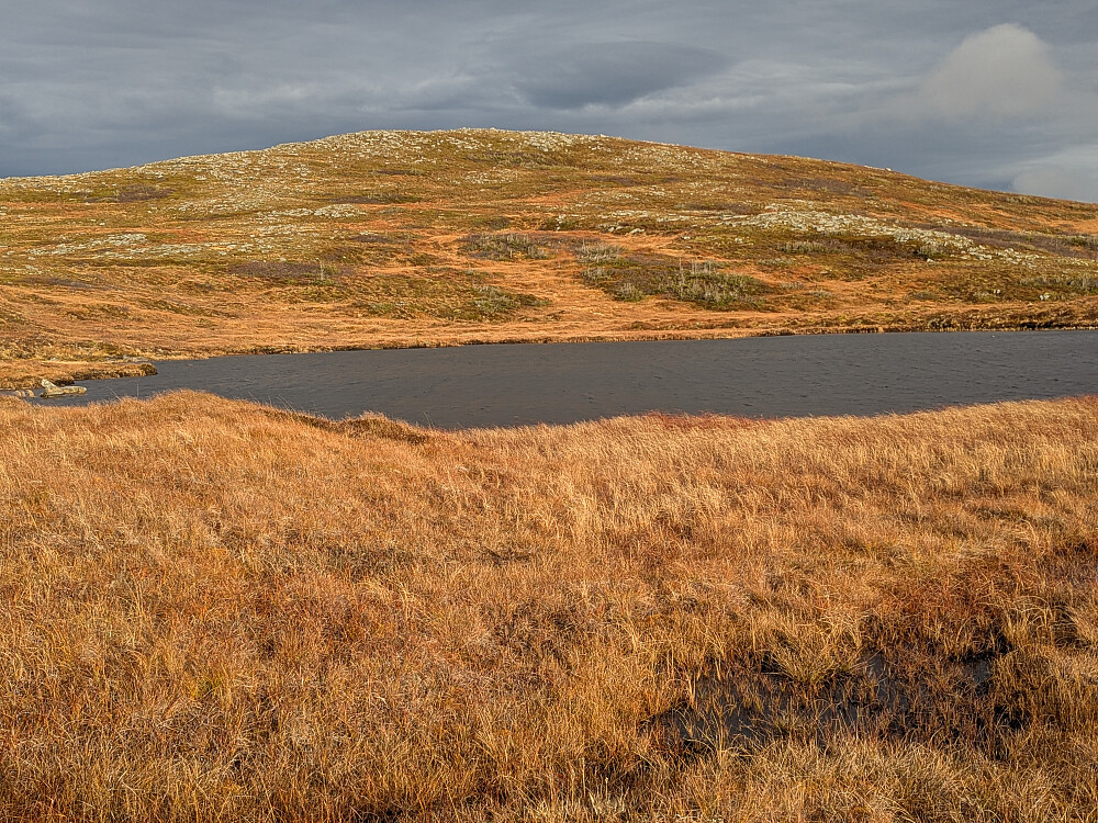 Sol på returen over vann 383 og fjell 463